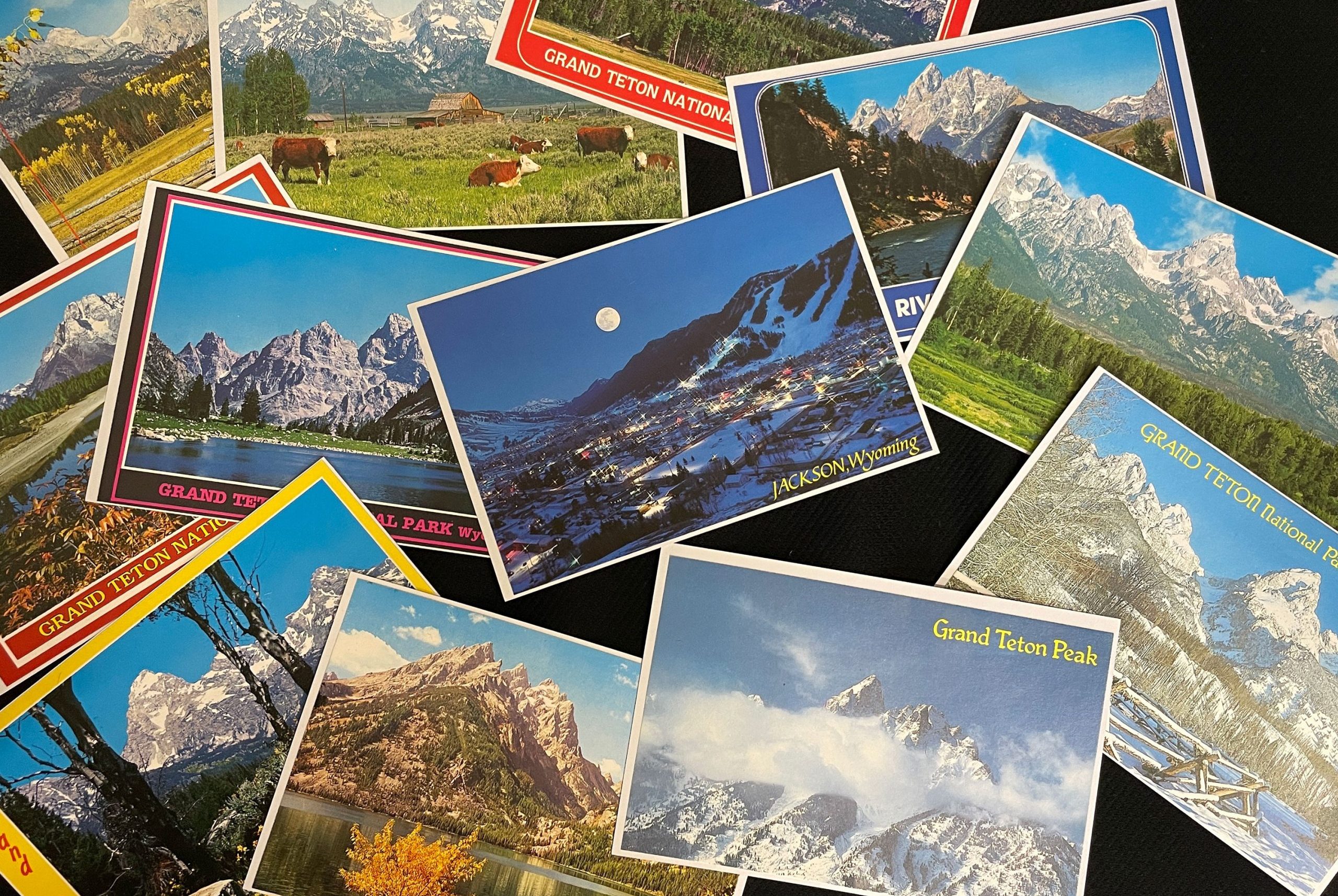 12 postcards show scenes from Grand Teton National Park in Wyoming, USA.